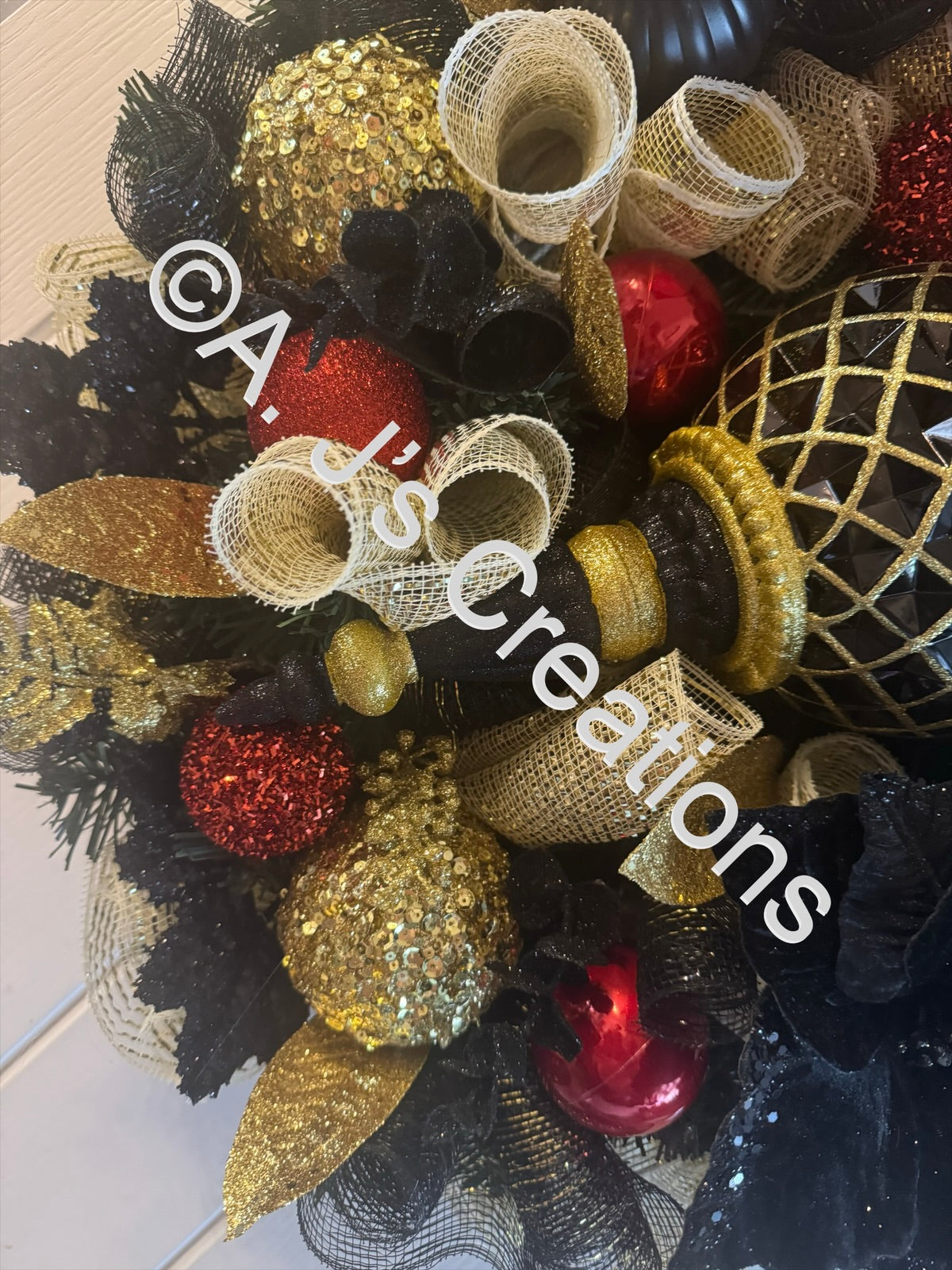 Black and Gold Finial Wreath