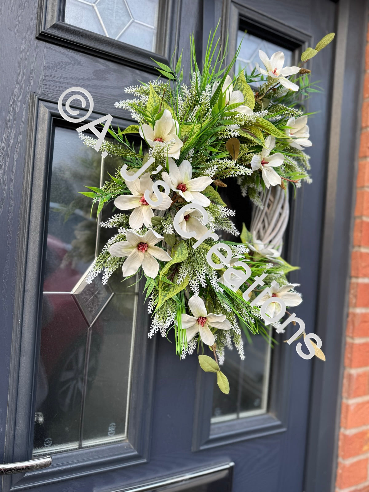 Wicker Rattan Wreath with Ivory Magnolias
